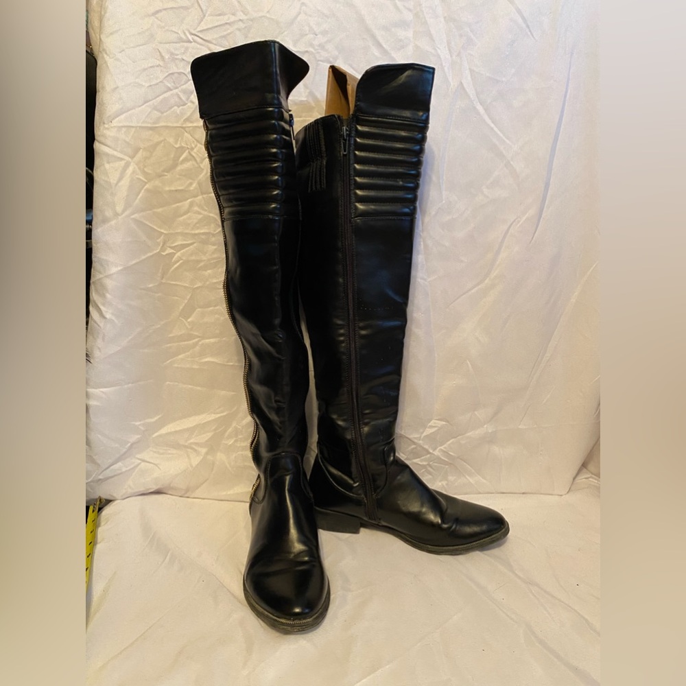 Black tall boots Size 6.5 will fit a size 7